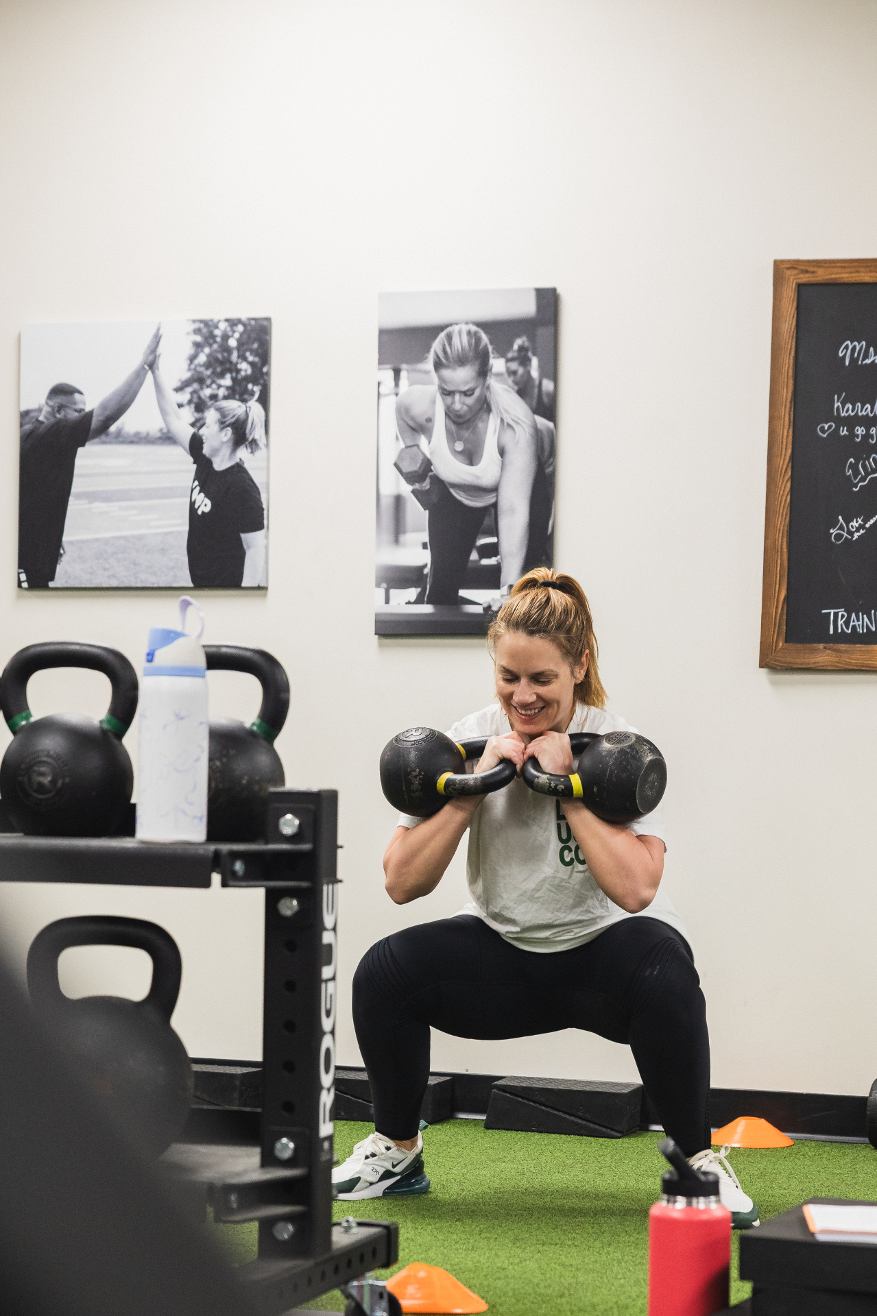 Adult client performing a kettlebell goblet squat
