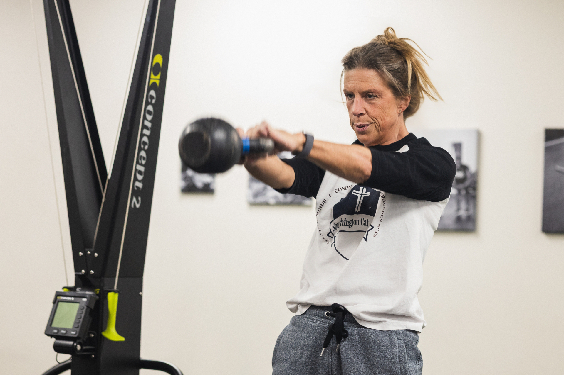 Adult member performing a kettlebell swing